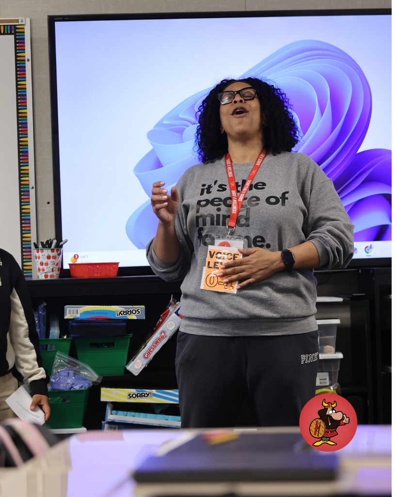students practicing performing in theater class