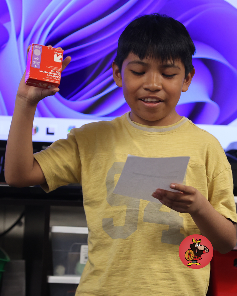 students practicing performing in theater class