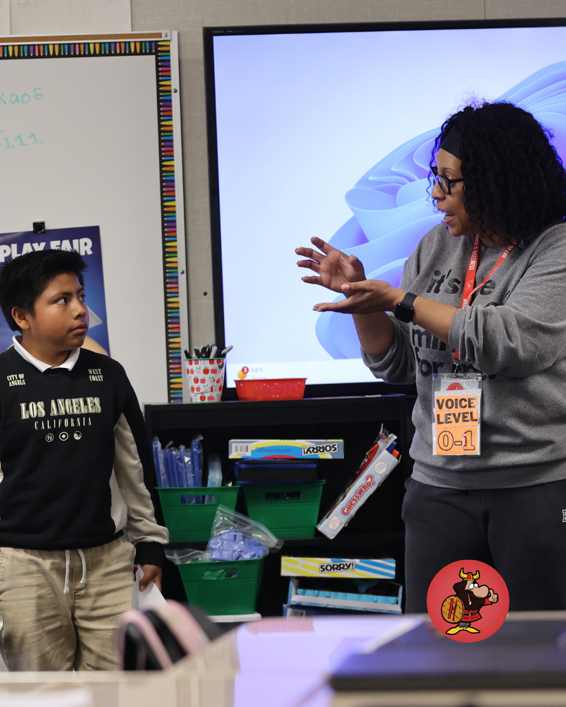 students practicing performing in theater class