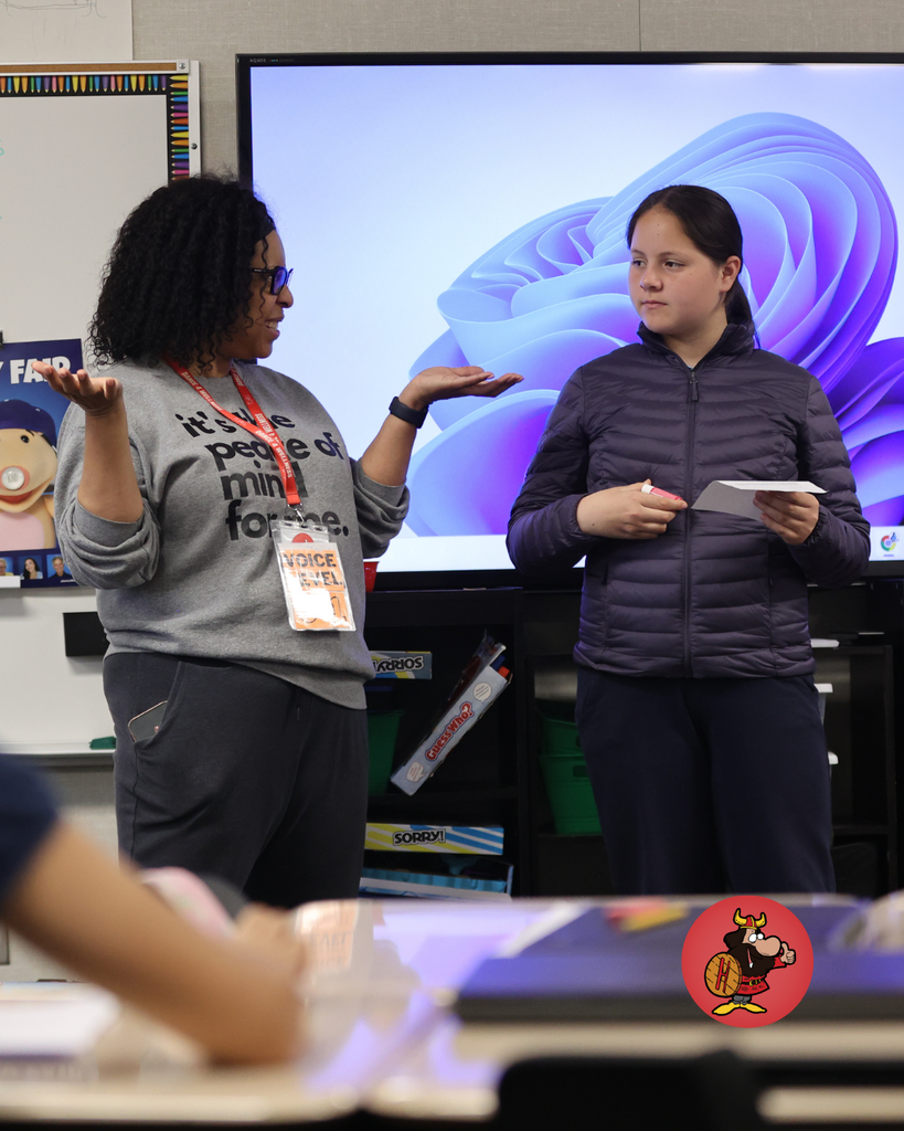 students practicing performing in theater class