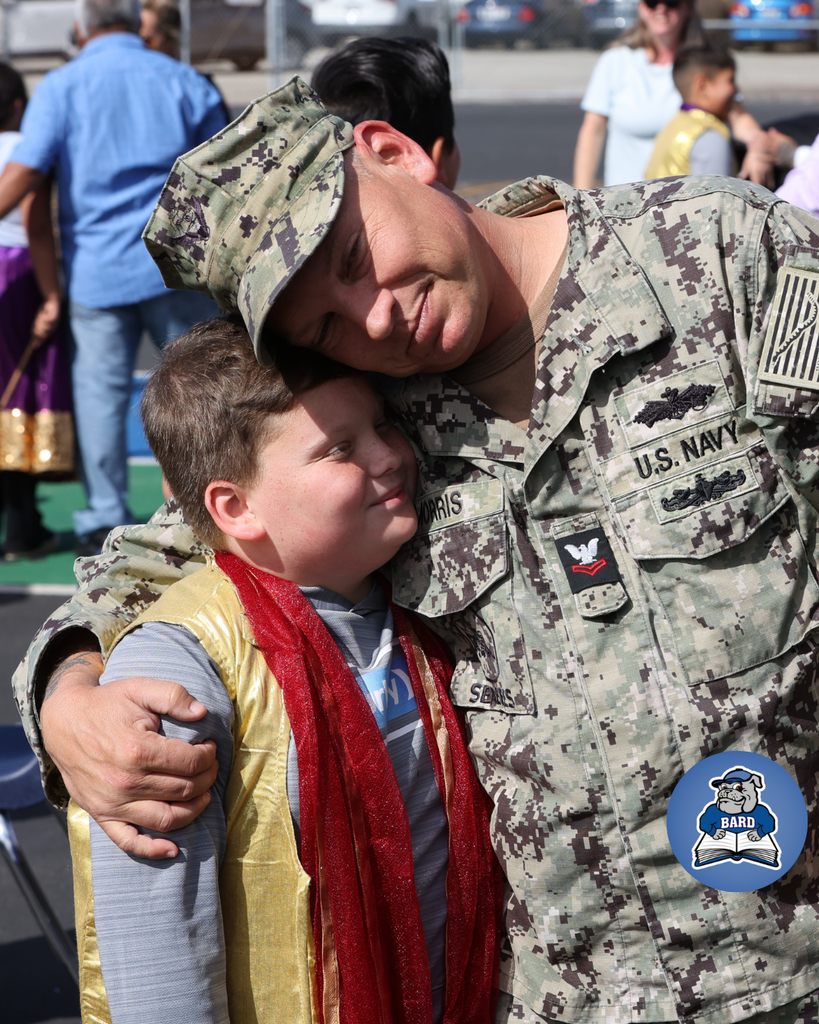Father and son hugging