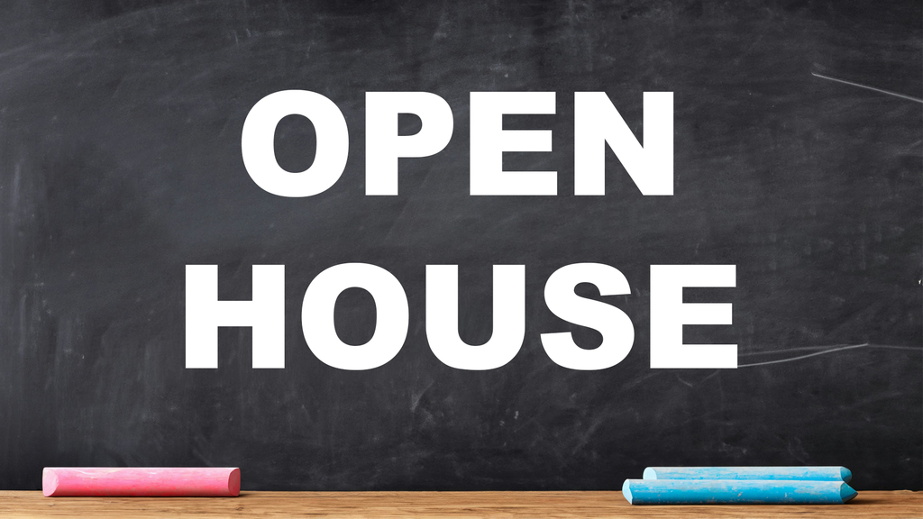 Open House sign on a chalk board.