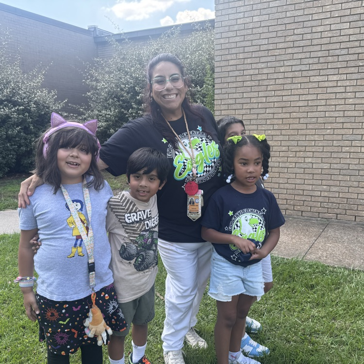 teacher with kids outside