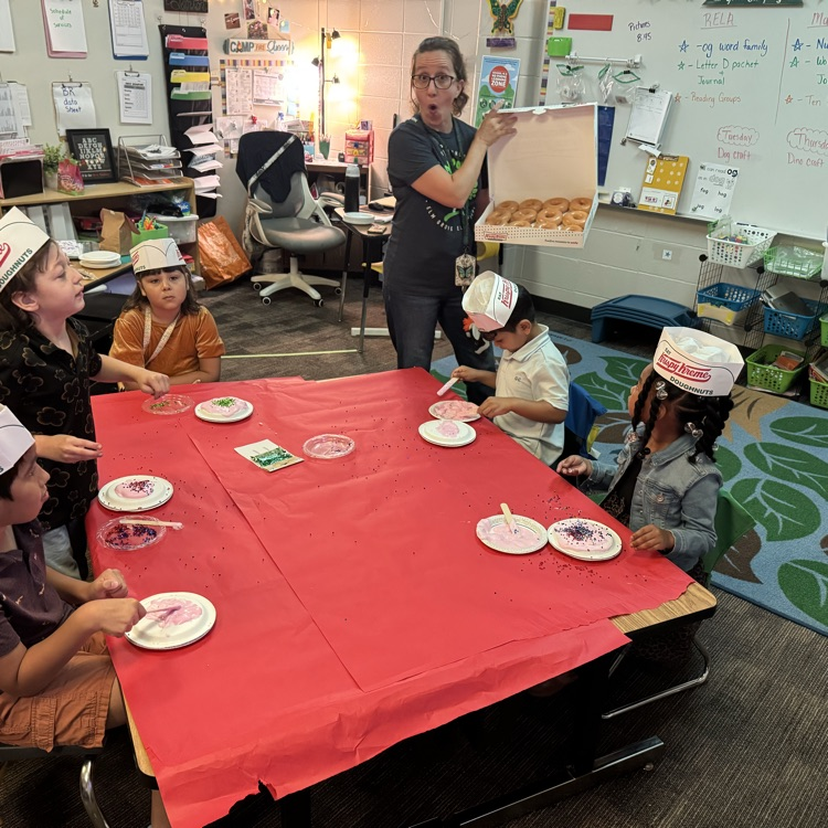 students in class talking about D for donuts