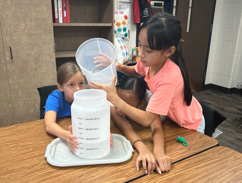 Students exploring conservation of matter