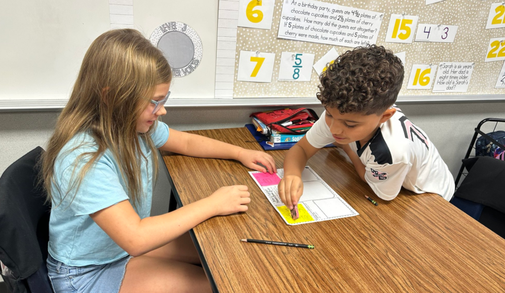 4th grade students solving math problems