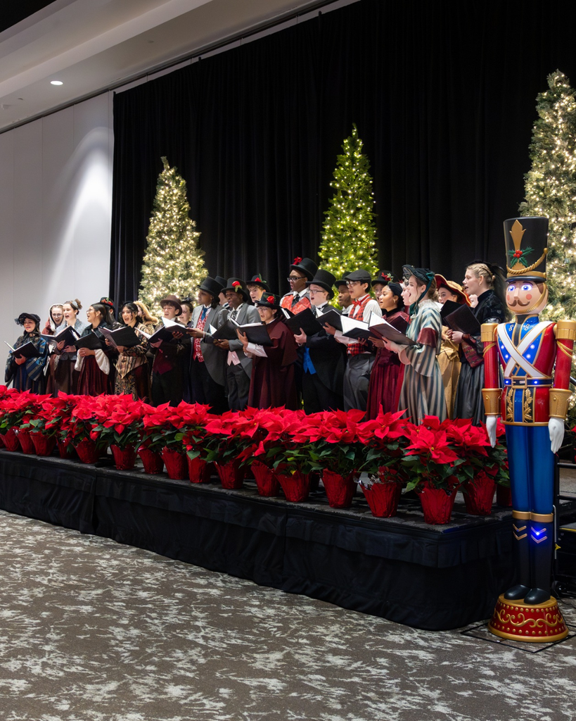Madrigals performing at luncheon