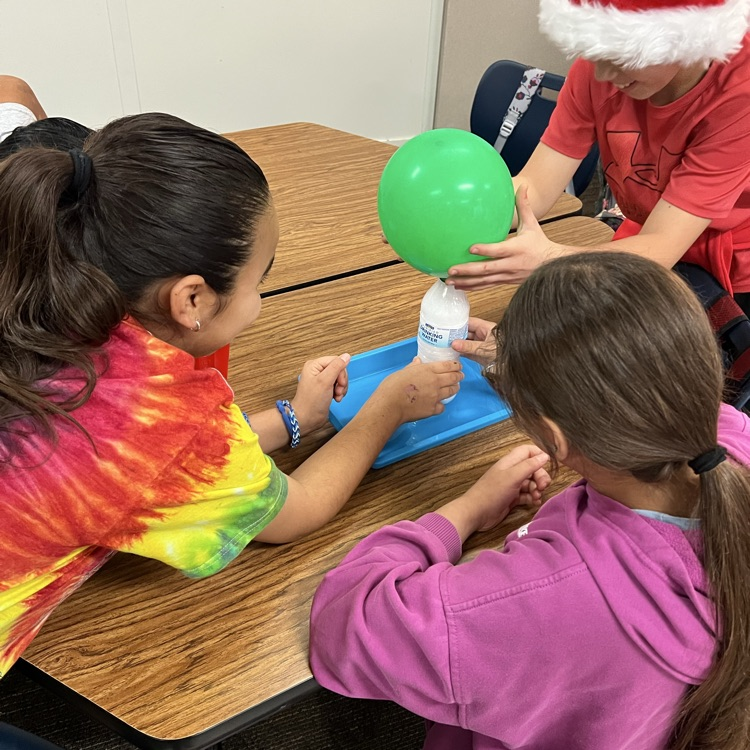 kids doing science experiment