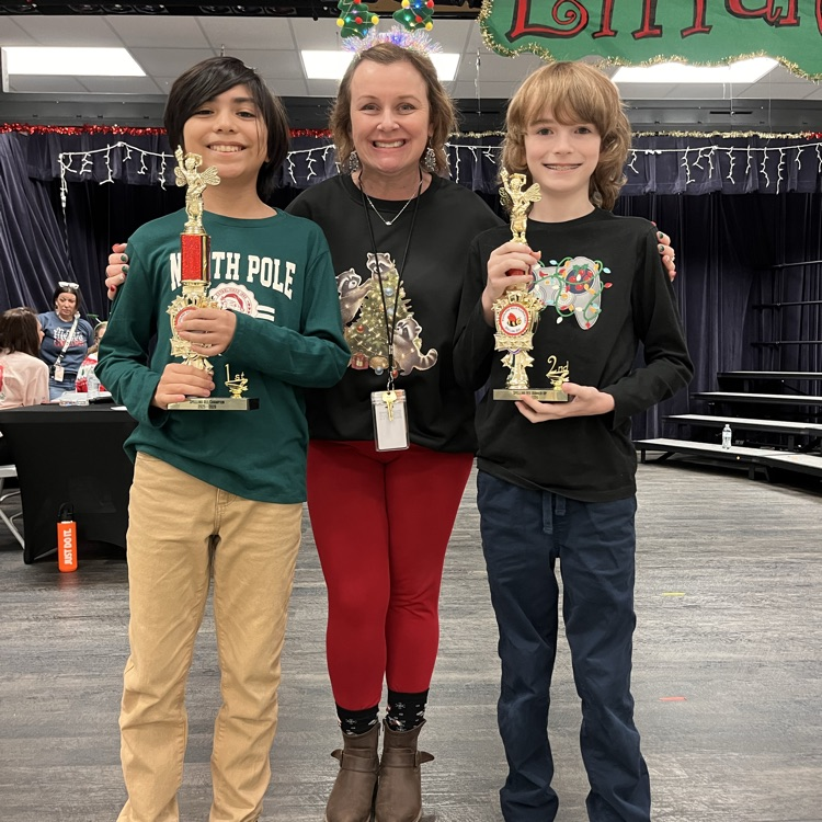 spelling bee champs and Ms Barker