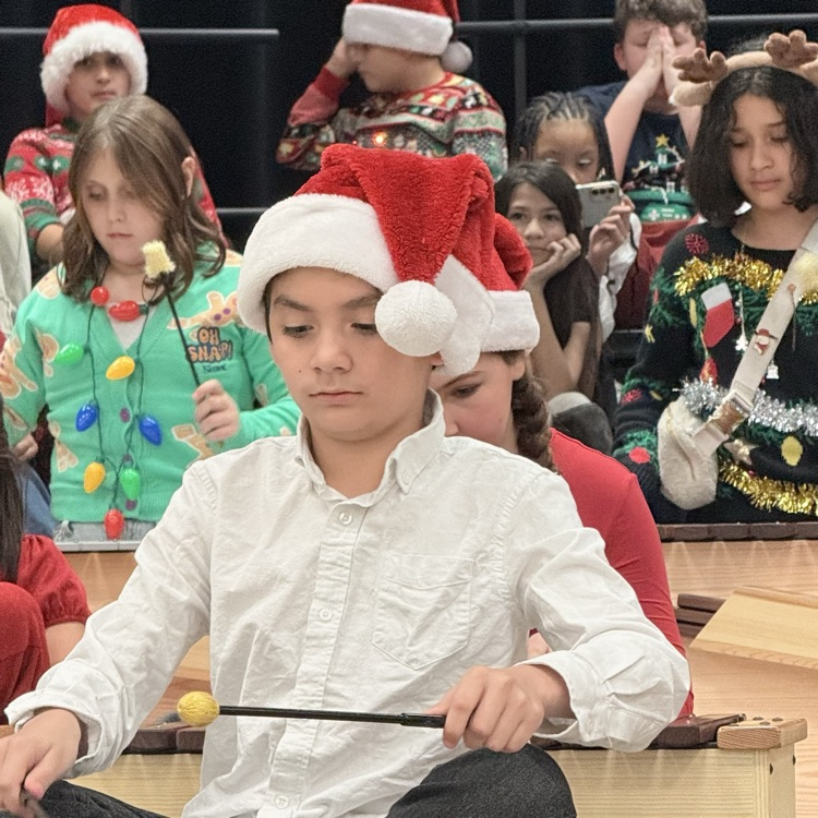 student playing instrument 