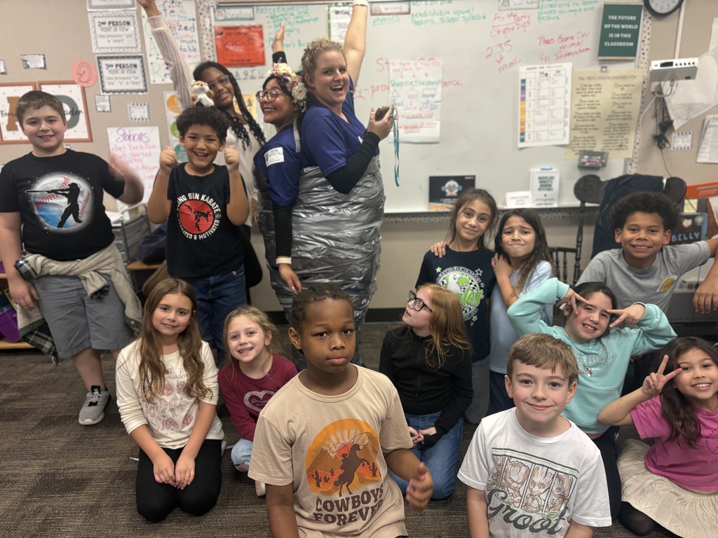 Boosterthon Staff was Duck Taped as a reward for Ms. Hale's students meeting their goal!