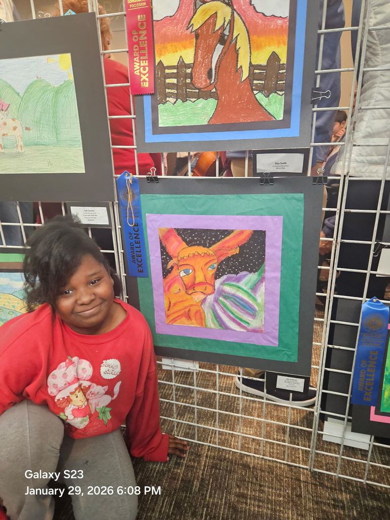 Ava at the Humble ISD Rodeo Art Show, Award of Excellence: "Majesty in Motion" oil pastel.