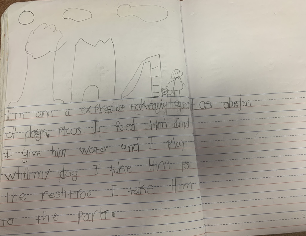 a student journal with writing in English and Spanish