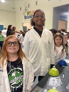 3rd grade students getting ready to complete a science lab.