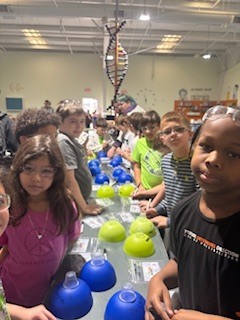 3rd grade students getting ready for a science lab.