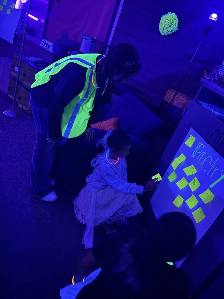 Sconzo Student helping kids 