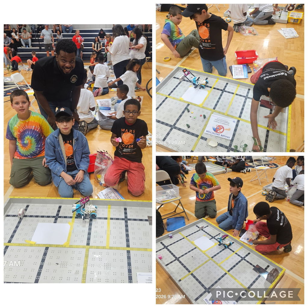 Mr. Mccants and his team in the robotics competition.