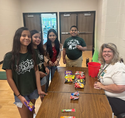 Ms. Craig and students enjoying Super Kids Day!