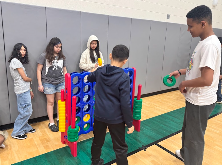 Students playing Connect 4 on Super Kids Day!