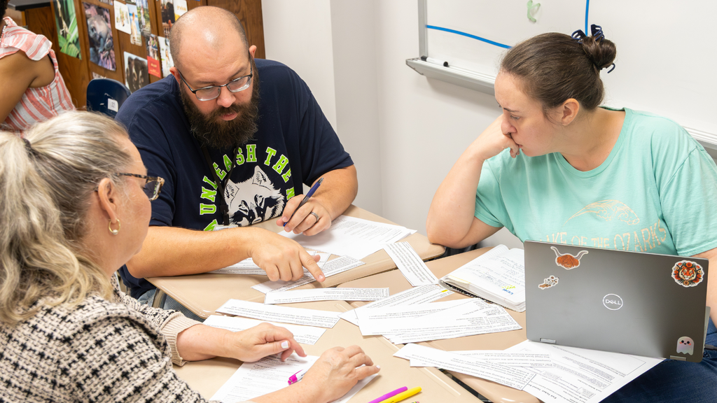 educators sorting scenarios in a group activity