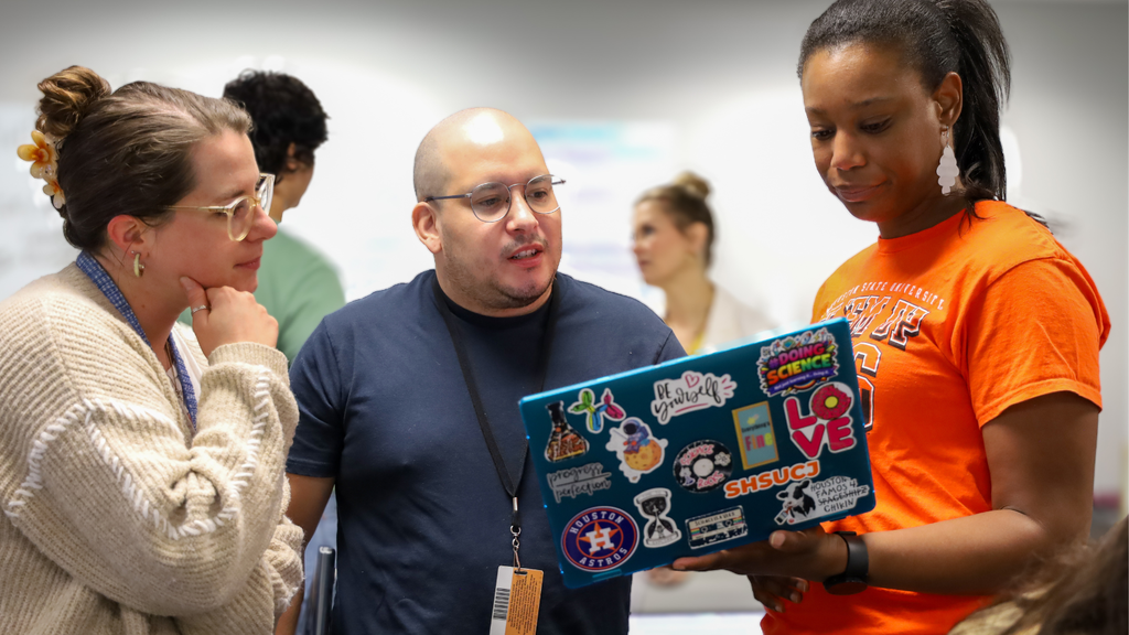 three educators collaborating