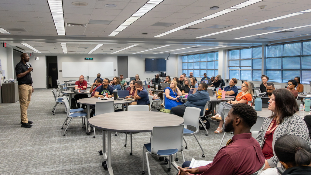 large room with educators