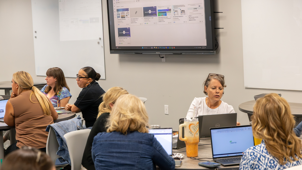 educators on laptops