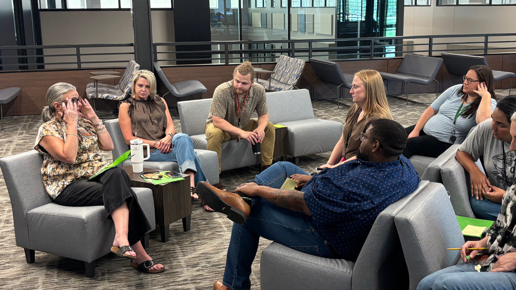 leaders sitting and discussing