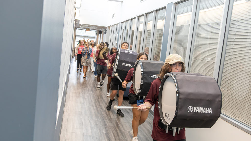 drumline walking down the hallway