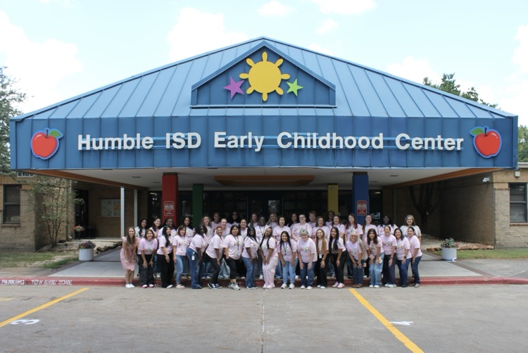 ECC staff group photo outside the building  
