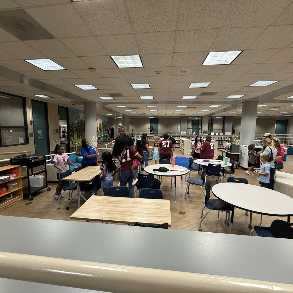 Staff welcoming families back to HHE
