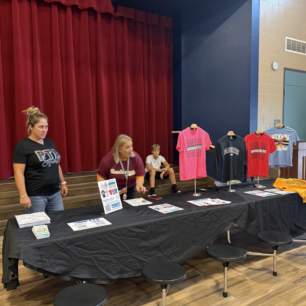 Staff welcoming families back to HHE