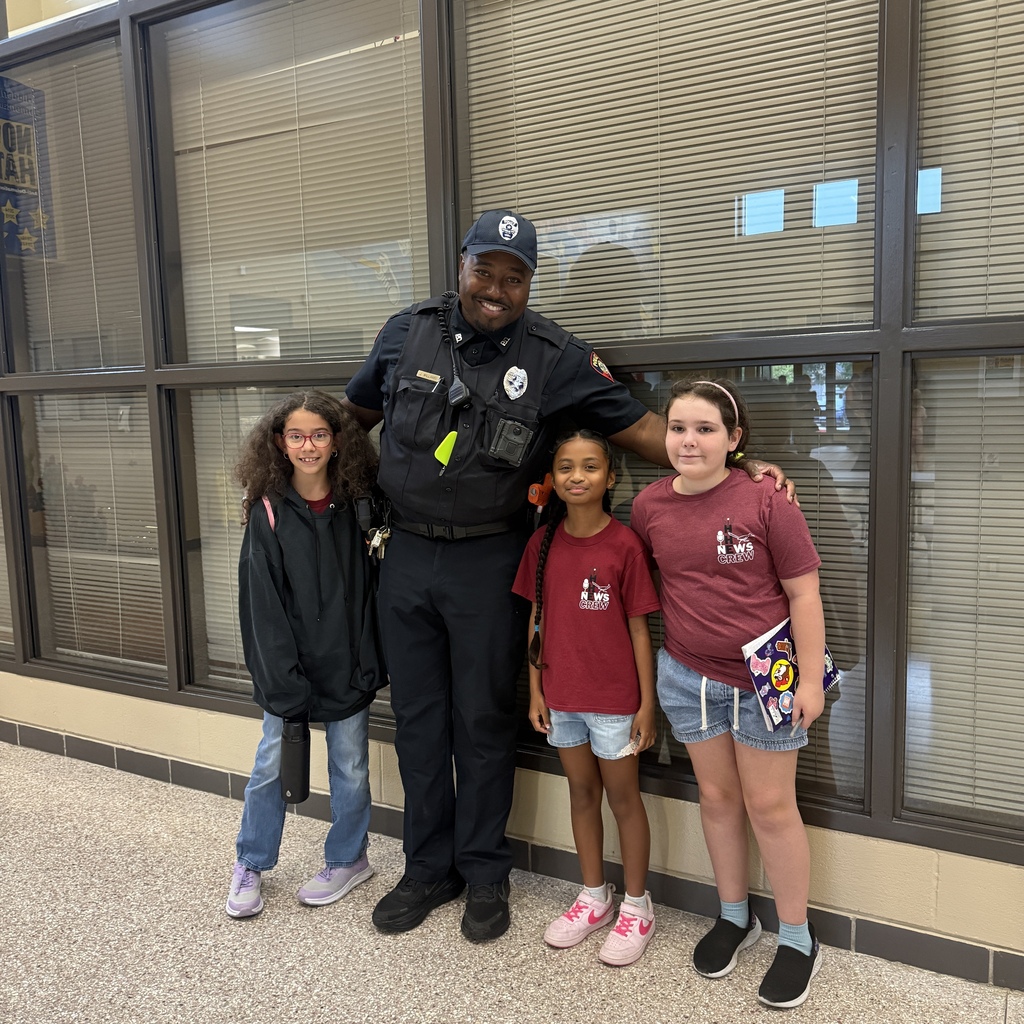 Staff welcoming families back to HHE