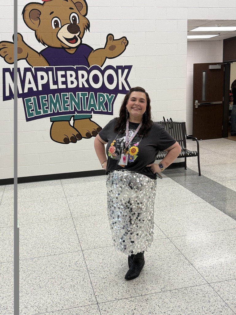  teacher wearing Dolly Parton shirt