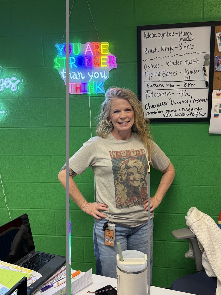  teacher wearing Dolly Parton shirt