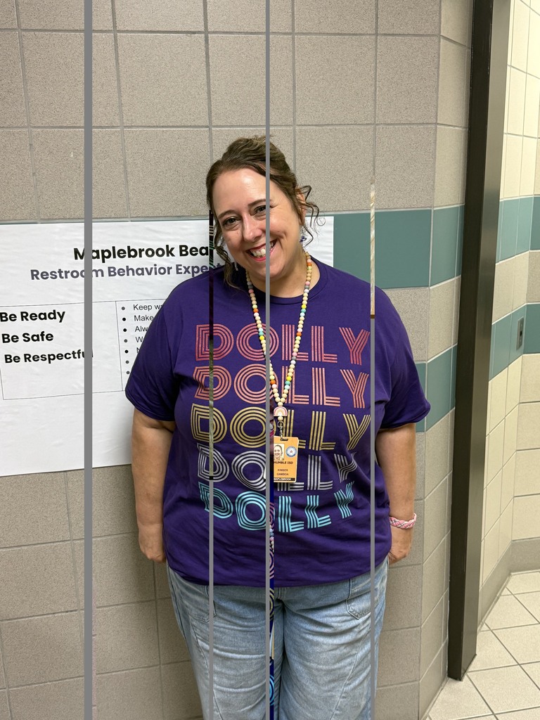  teacher wearing Dolly Parton shirt