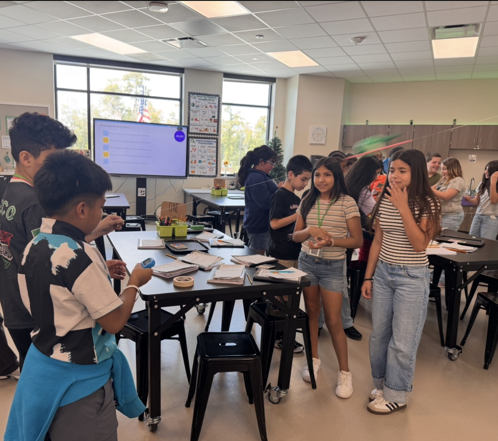 Students testing their balloon rockets in the science lab.