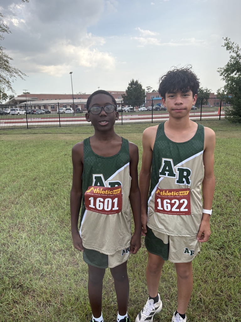 cross country boys getting ready for the meet