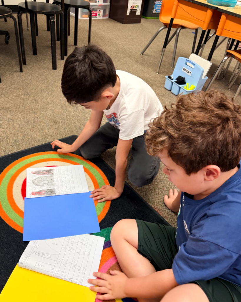 Student sharing his writing