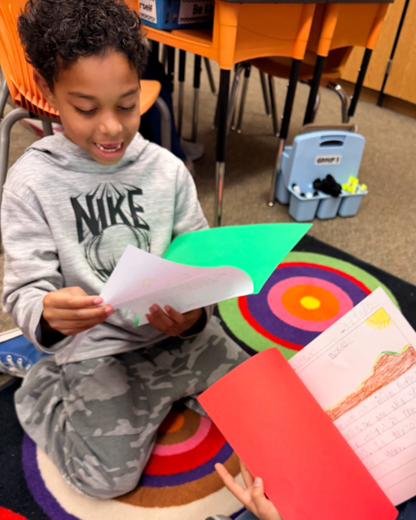 Student sharing his writing
