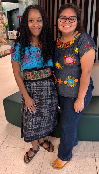 Ms. Walter and Ms. Estrada in their traditional clothing.