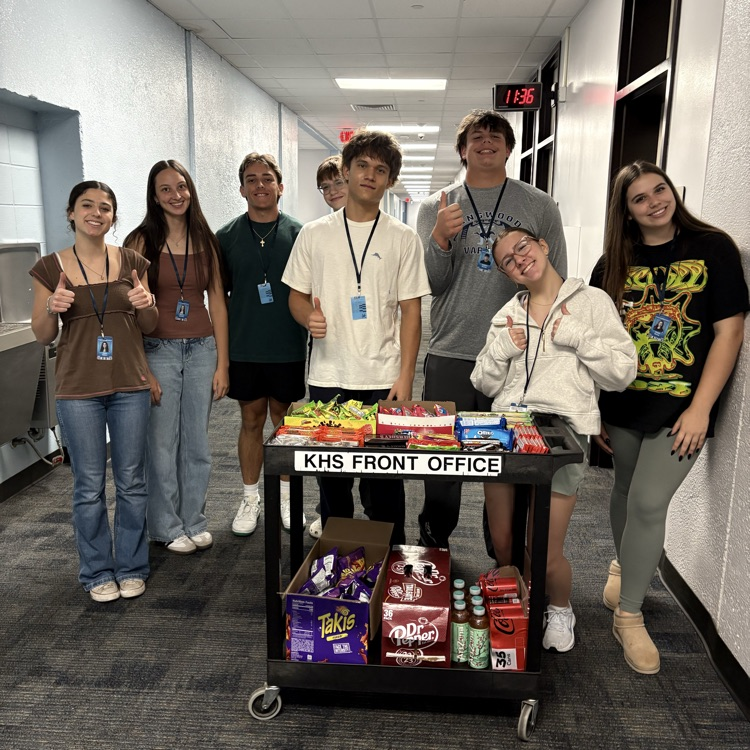 mustang market students with a snack cart