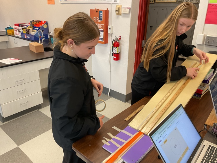 Students building a ramp  