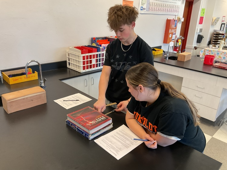 students compare types of friction