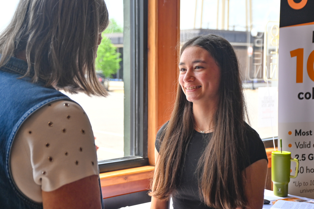 student receiving honor cord