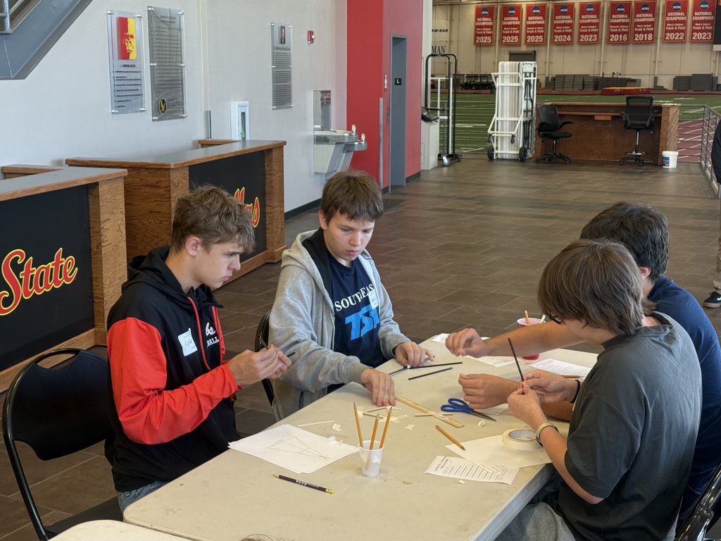 Cyler Mason works with students from other chapters on a structural challenge.