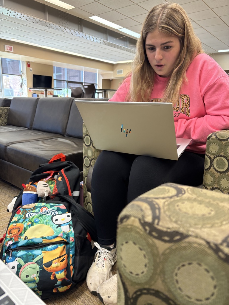Students filling out applications 