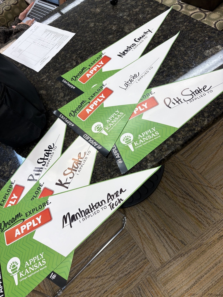 Students filling out applications 