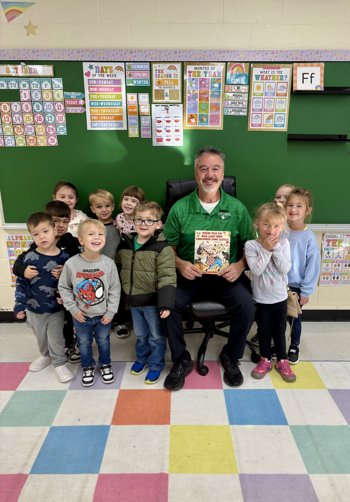 Board Member reading to preschool class