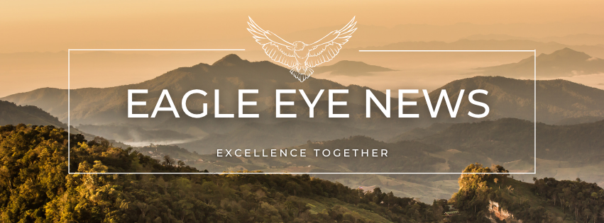 Beige and green mountains in the distance. There is a white rectangle with an eagle at the top enter and the words "Eagle Eye News" and "excellence together" in the center.